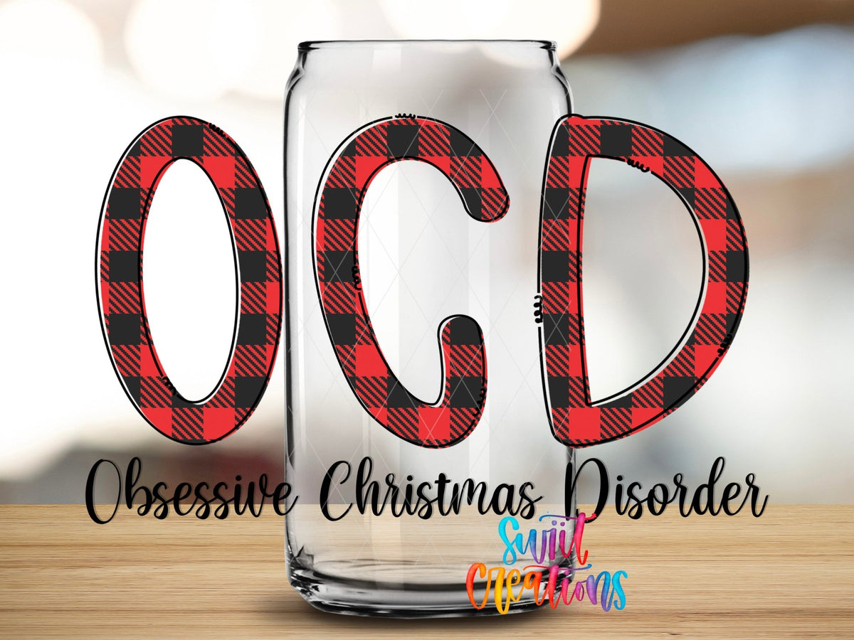 OCD Obsessive Christmas Disorder UV DTF transfer applied to a clear glass can from Swiit Creations