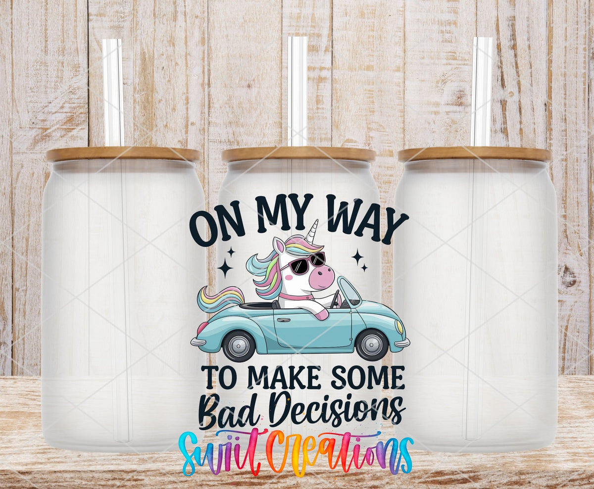 On My Way To Make Some Bad Decisions Unicorn UV DTF transfer applied to a clear glass can set from Swiit Creations