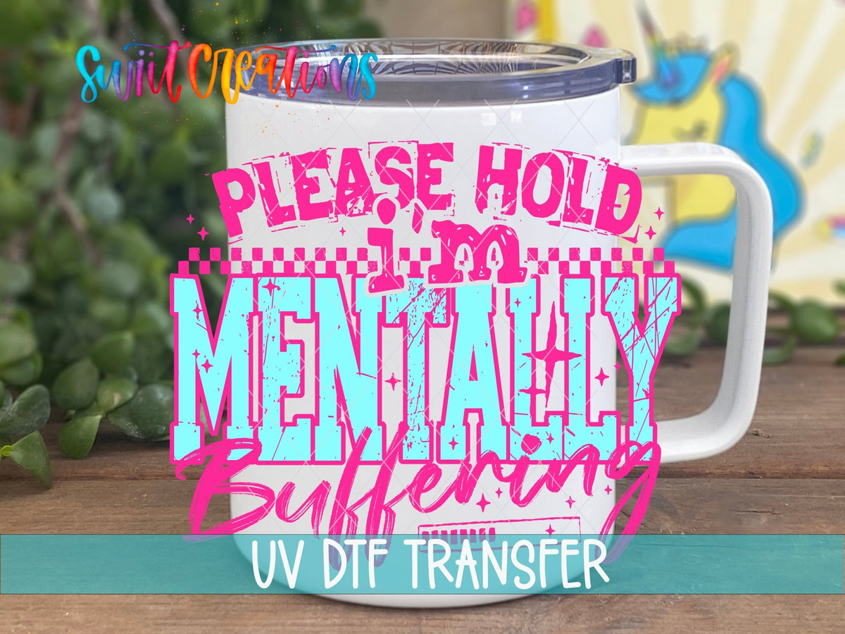 Please Hold I’m Mentally Buffering UV DTF transfer displayed on a white coffee mug from Swiit Creations