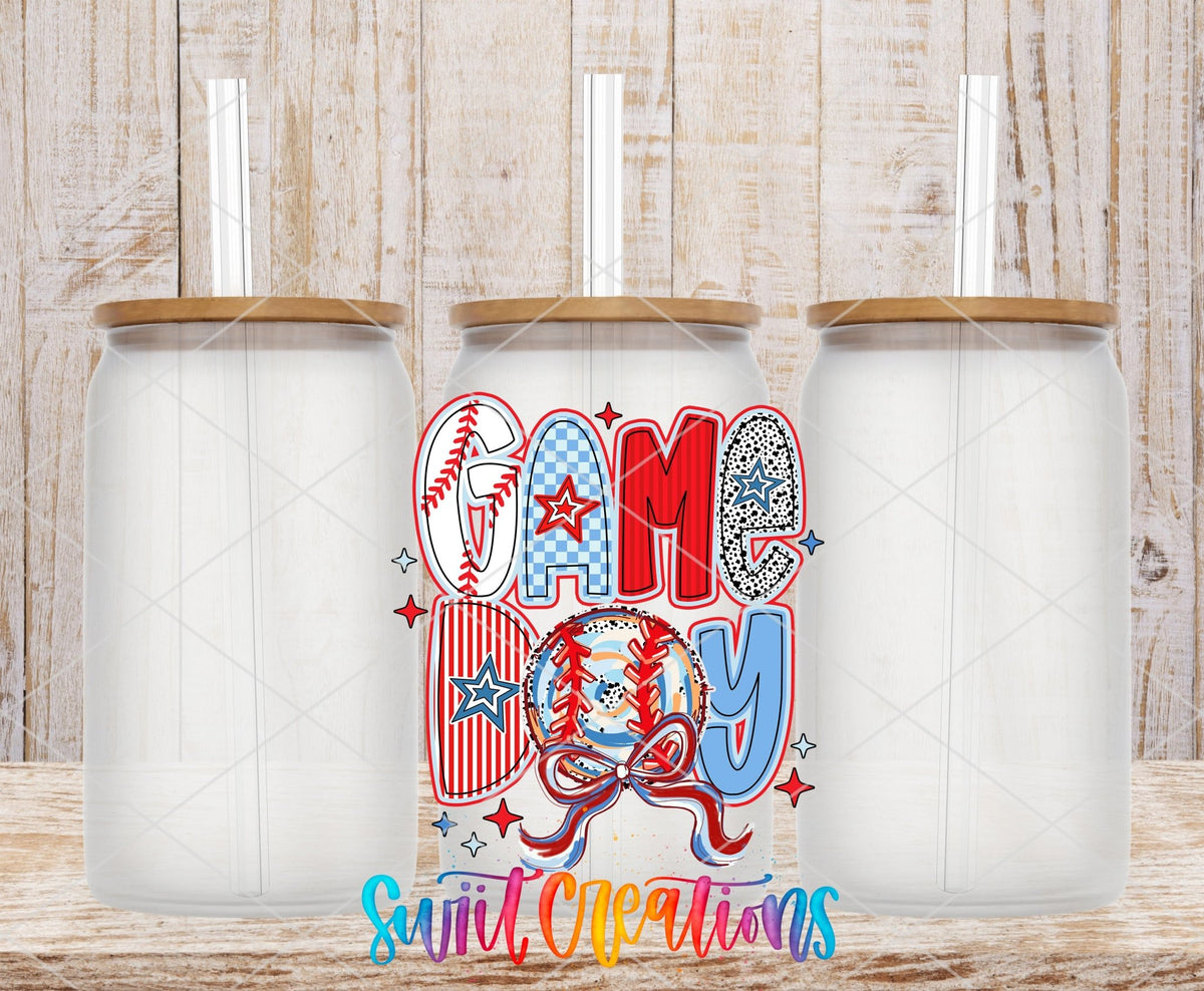 Red White and Blue Game Day Baseball UV DTF transfer applied to a clear glass can set from Swiit Creations