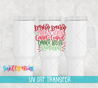 Three white tumblers featuring the Reindeer Names Christmas UV DTF transfer by Swiit Creations