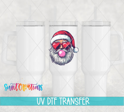 Swiit Creations UV DTF Retro Santa Heart Sunglasses Bubble Gum transfer shown on a white tumbler set