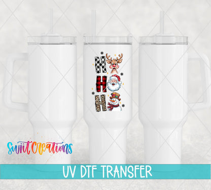 Swiit Creations UV DTF Santa Reindeer Snowman transfer shown on a white tumbler set