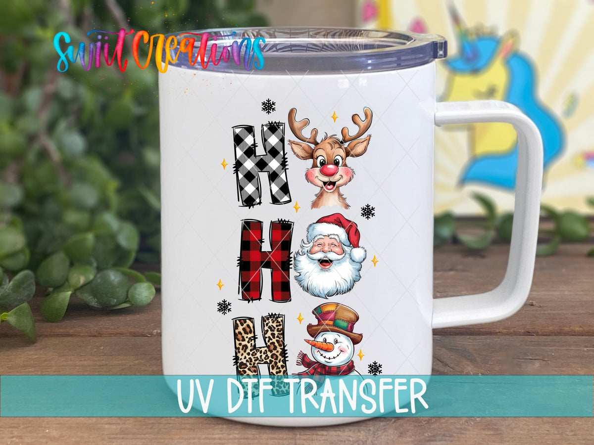 Swiit Creations UV DTF Santa Reindeer Snowman transfer displayed on a white coffee mug