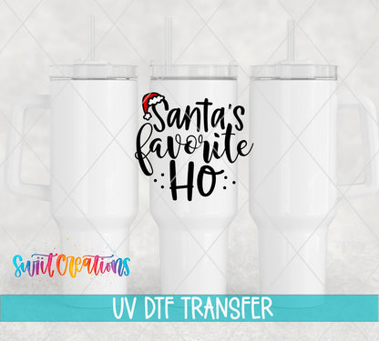 Swiit Creations UV DTF Santa’s Favorite Ho Christmas transfer shown on a white tumbler set