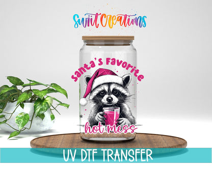Swiit Creations UV DTF Santa’s Favorite Hot Mess Raccoon transfer displayed on a clear jar mockup