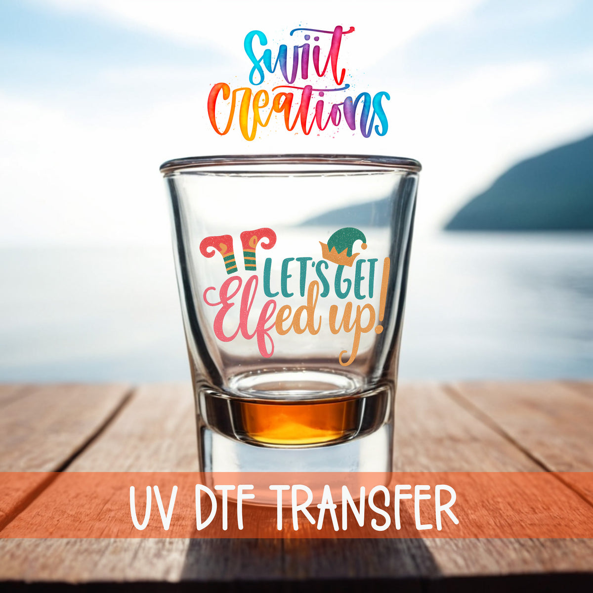 Let's Get Elfed Up Christmas elf shot glass UV DTF transfer shown on a clear shot glass against a waterfront background with an orange UV DTF Transfer banner.