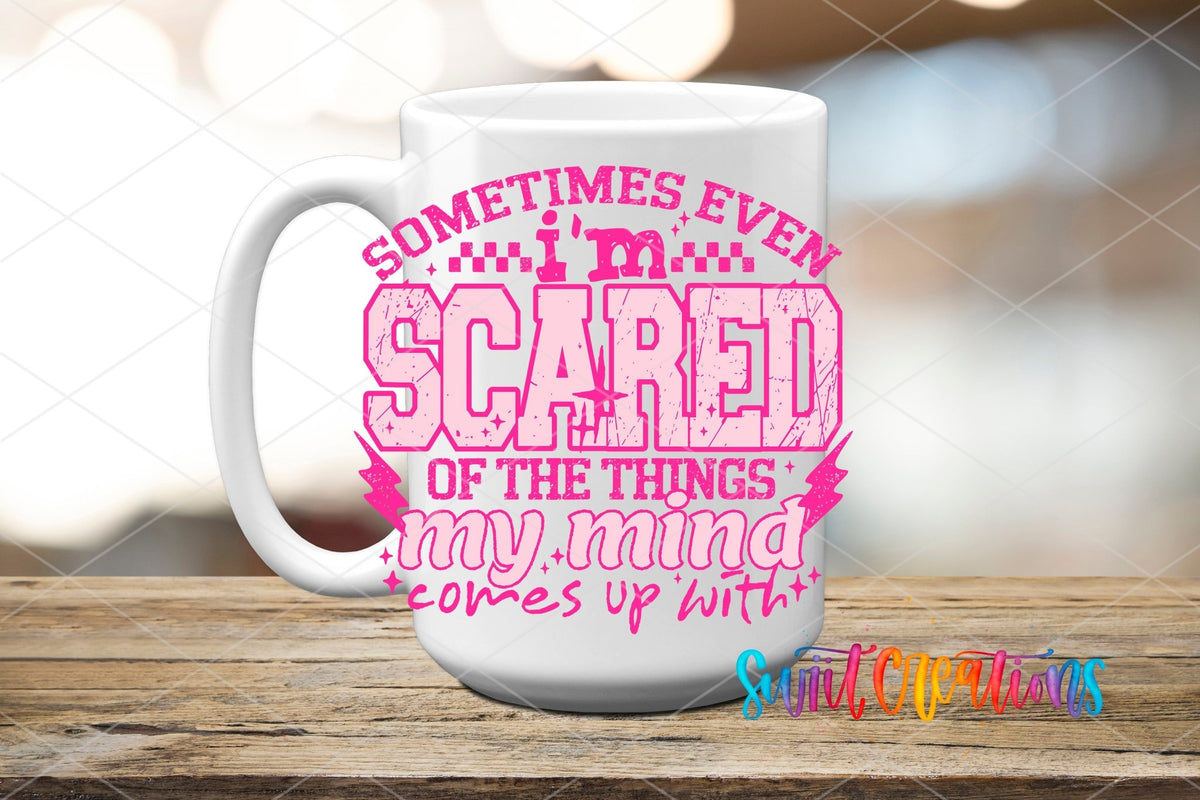 Sometimes Even I’m Scared Of The Things My Mind Comes Up With Pink UV DTF transfer displayed on a white ceramic mug from Swiit Creations