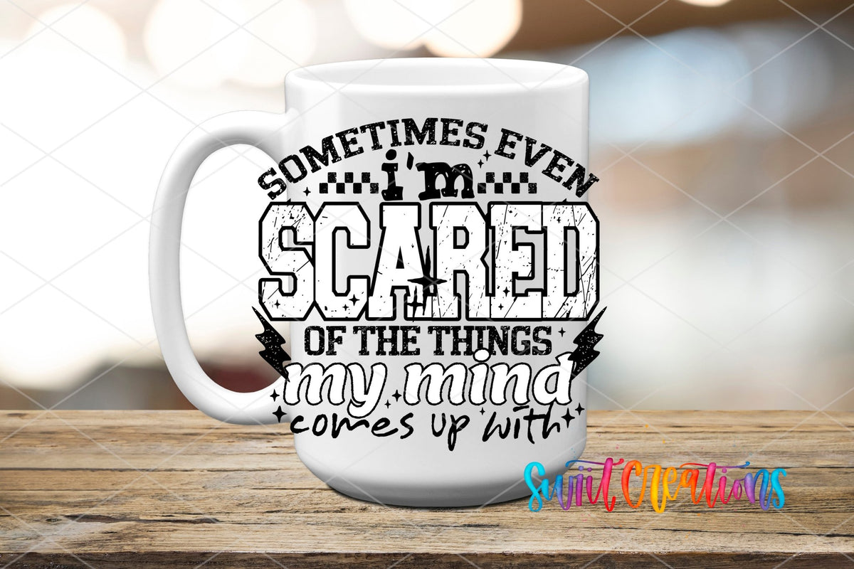 Sometimes Even I’m Scared UV DTF transfer displayed on a white ceramic mug from Swiit Creations