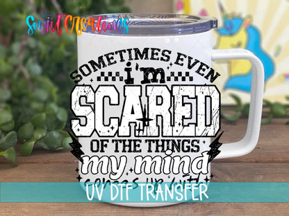 Sometimes Even I’m Scared UV DTF transfer displayed on a white coffee mug from Swiit Creations