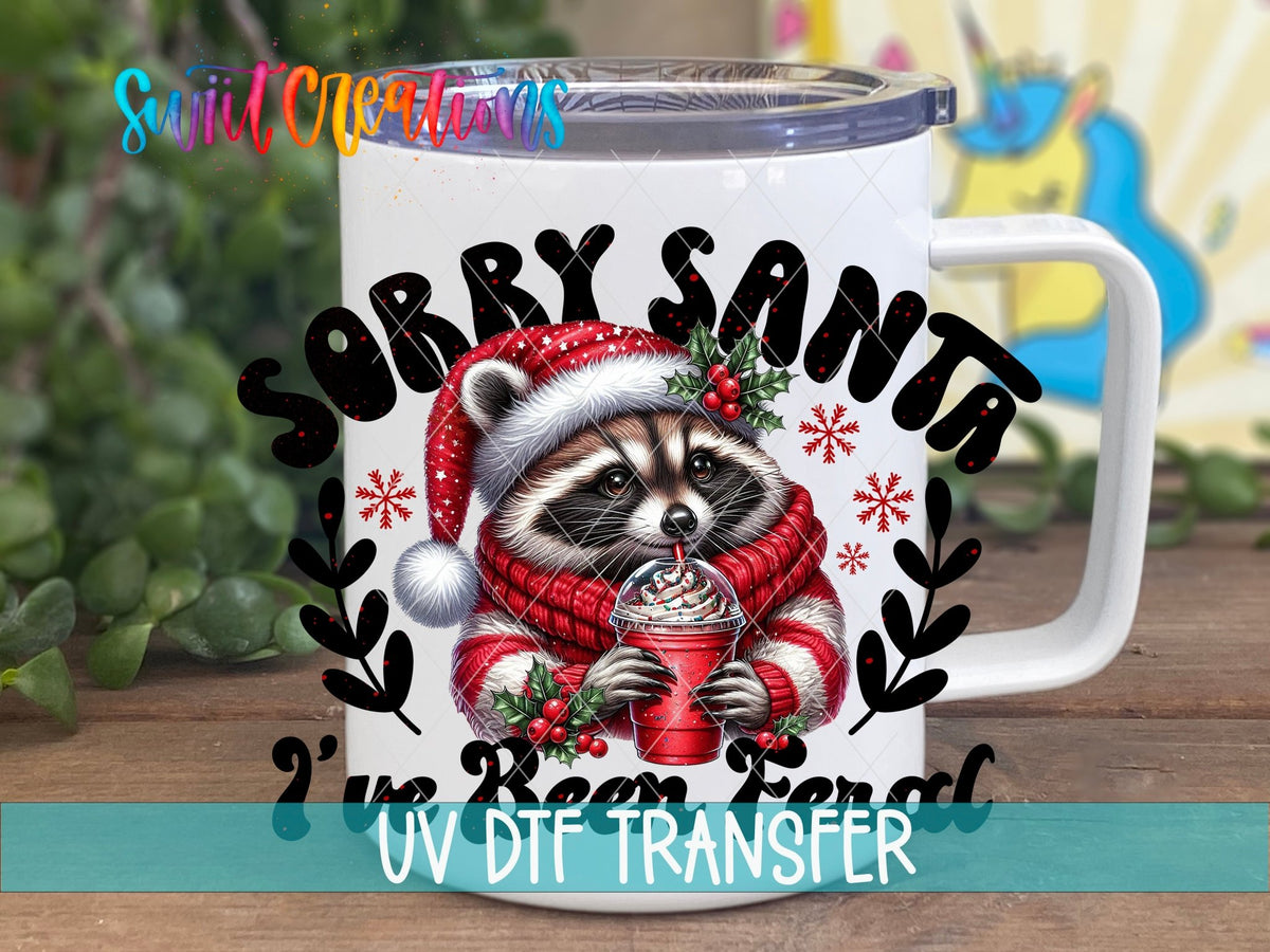 Swiit Creations UV DTF Feral Raccoon Christmas transfer displayed on a white coffee mug