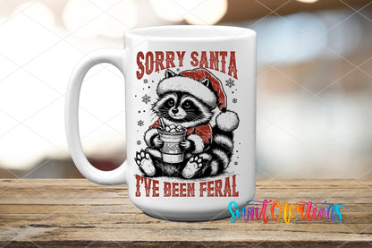 Swiit Creations UV DTF Feral Raccoon Christmas transfer applied to a white ceramic mug