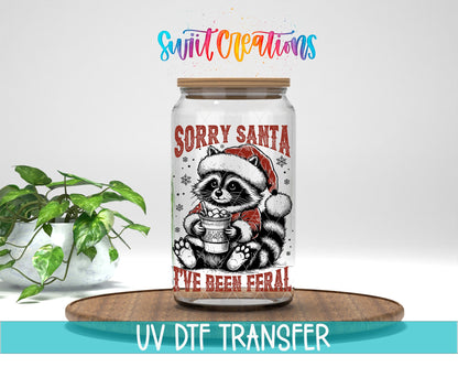Swiit Creations UV DTF Feral Raccoon Christmas transfer displayed on a clear jar mockup