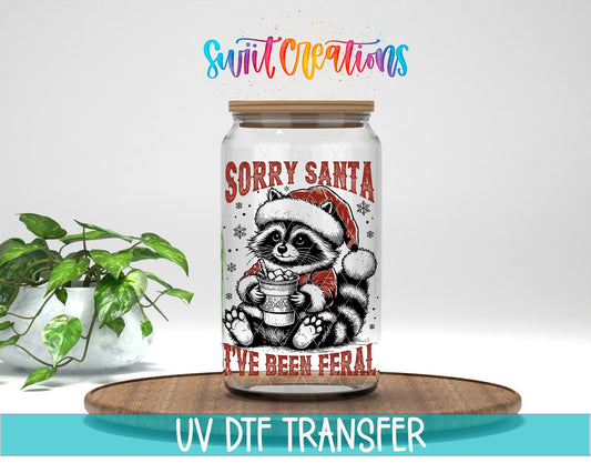 Swiit Creations UV DTF Feral Raccoon Christmas transfer displayed on a clear jar mockup