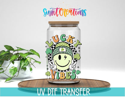 St Patricks Lucky Vibes UV DTF transfer displayed on a clear jar mockup from Swiit Creations