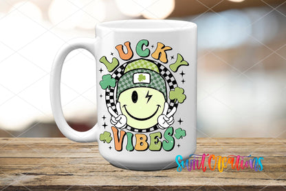 St Patricks Lucky Vibes UV DTF transfer displayed on a white ceramic mug from Swiit Creations