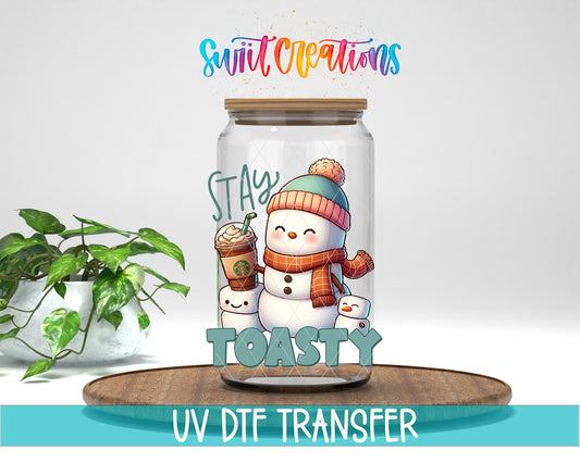 Swiit Creations UV DTF Stay Toasty Snowman Coffee Christmas transfer displayed on a clear jar mockup