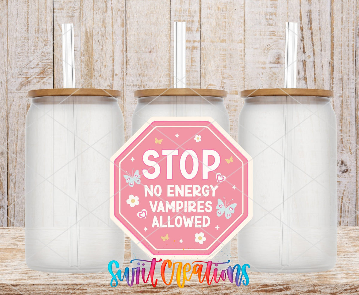 Stop No Energy Vampires UV DTF transfer applied to a clear glass can set from Swiit Creations