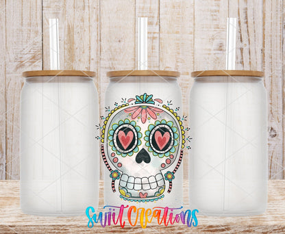 Sugar Skull Heart Eyes UV DTF transfer applied to a clear glass can set from Swiit Creations