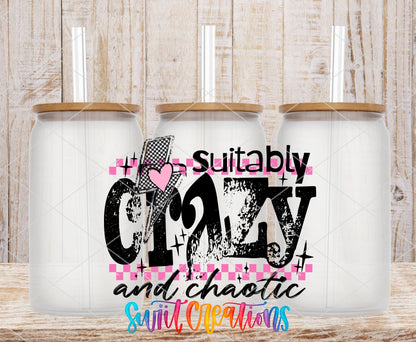 Suitably Crazy And Chaotic UV DTF transfer applied to a clear glass can set from Swiit Creations