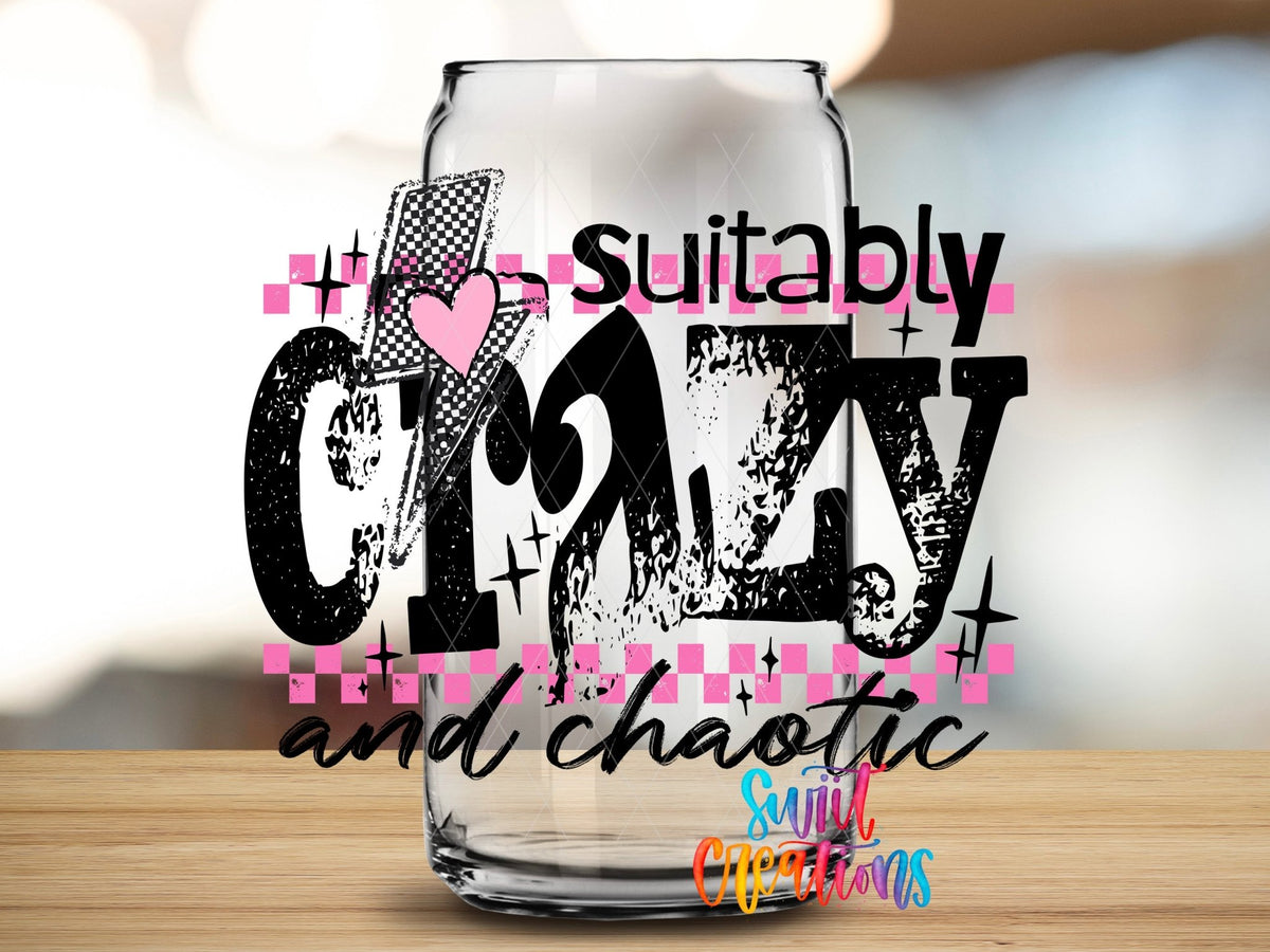 Suitably Crazy And Chaotic UV DTF transfer applied to a clear glass can from Swiit Creations