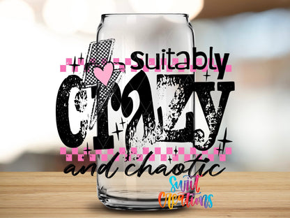 Suitably Crazy And Chaotic UV DTF transfer applied to a clear glass can from Swiit Creations