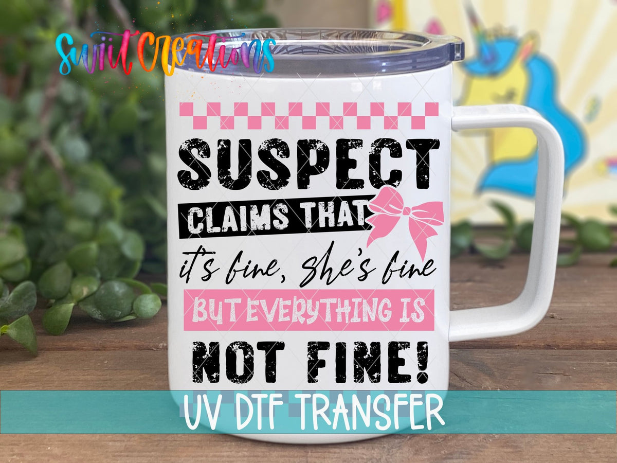 Suspect Claims She’s Fine UV DTF transfer displayed on a white coffee mug from Swiit Creations