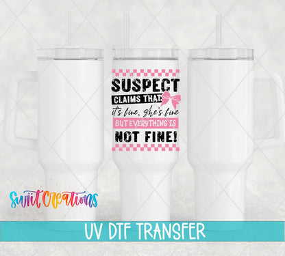 Suspect Claims She’s Fine UV DTF transfer applied to a white tumbler set from Swiit Creations