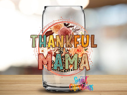 Thankful Mama Fall Floral Leopard UV DTF transfer applied to a clear glass can from Swiit Creations