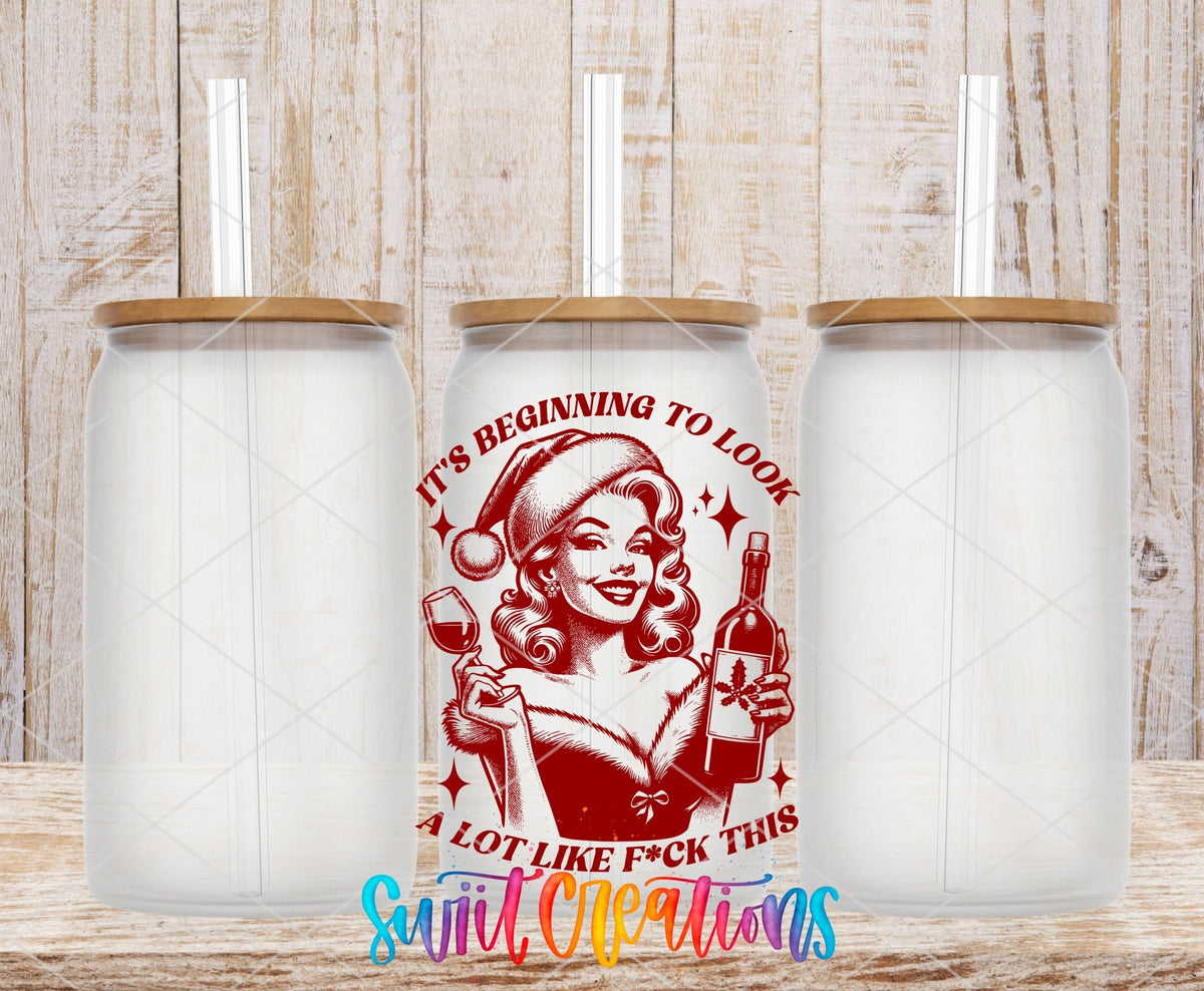 Swiit Creations UV DTF This Christmas Wine Lady transfer shown on a clear glass can set