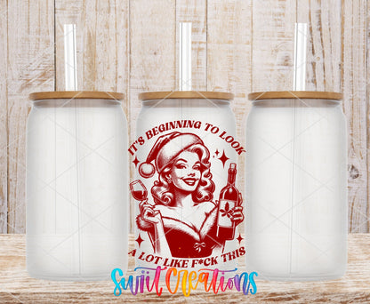 Swiit Creations UV DTF This Christmas Wine Lady transfer shown on a clear glass can set
