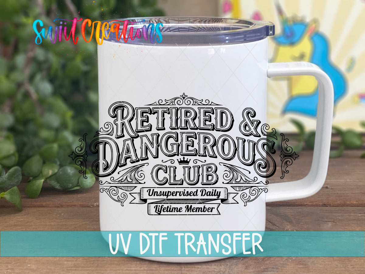 Retired and Dangerous Club UV DTF transfer displayed on a white handled travel mug