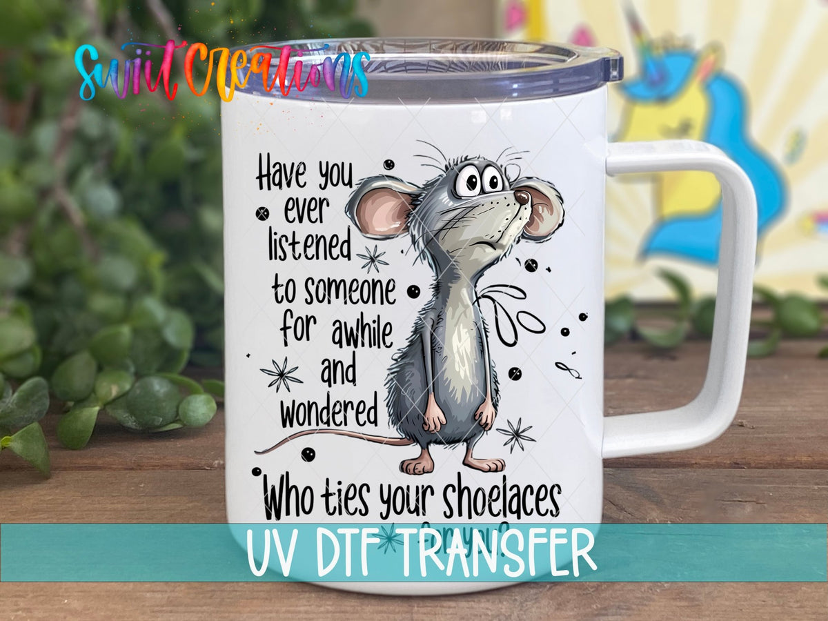 Who Ties Your Shoelaces UV DTF transfer displayed on a white coffee mug from Swiit Creations
