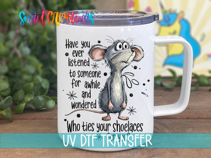 Who Ties Your Shoelaces UV DTF transfer displayed on a white coffee mug from Swiit Creations