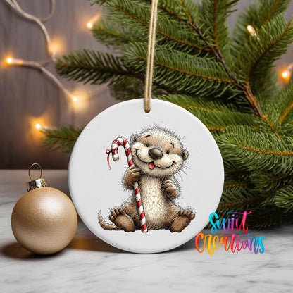Woodland Otter With Candy Cane Christmas Ornament UV DTF Transfer | O-1880 - Swiit Creations